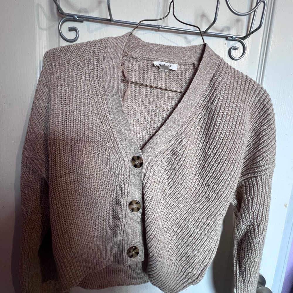 Knit Mid drif jacket top.
